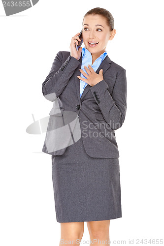Image of Businesswoman chatting on her mobile phone