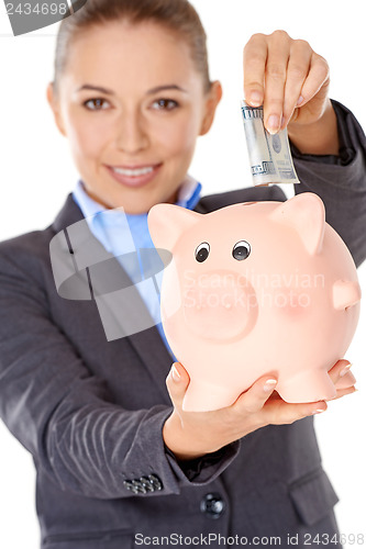 Image of Successful happy woman saving her money