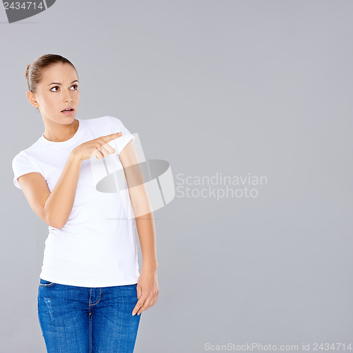 Image of Woman pointing in disbelief