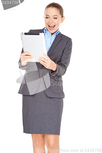 Image of Excited businesswoman with a tablet -pc