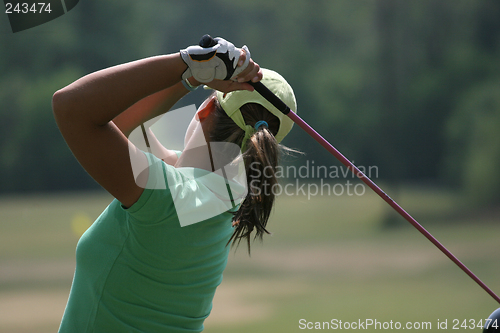 Image of lady golf swing