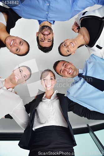 Image of business people group joining hands