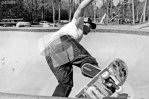 Image of Skateboarder Skating a Bowl