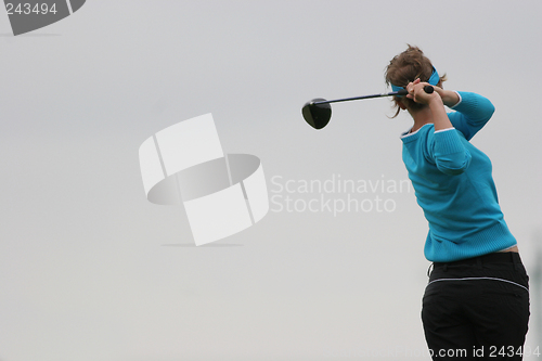 Image of lady golf swing
