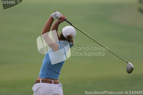 Image of lady golf swing