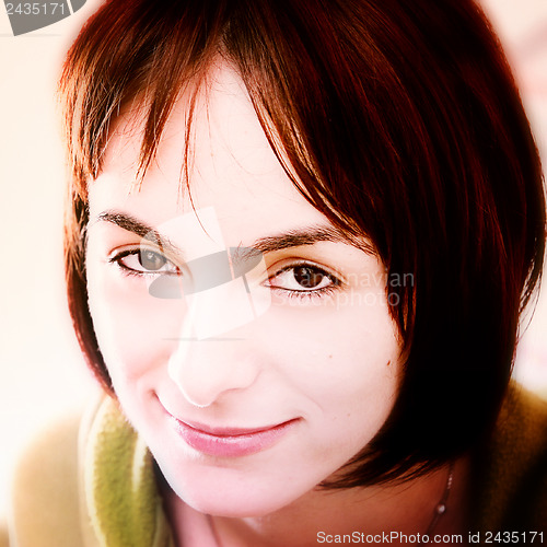 Image of Young woman in bed
