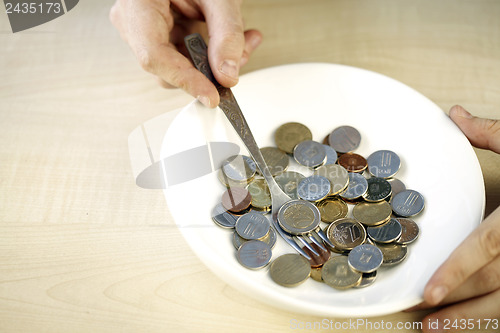 Image of Eating some coins