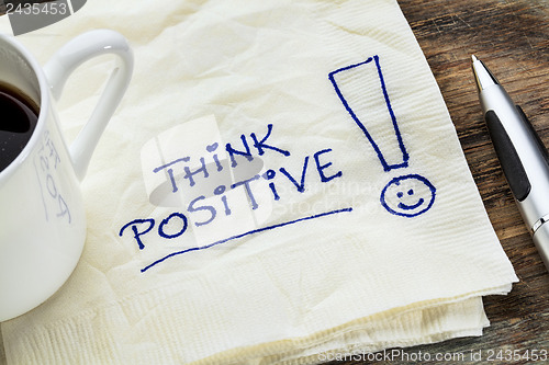 Image of think positive on a napkin