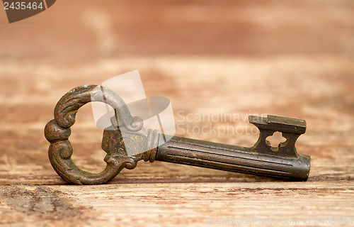 Image of Retro key on wooden table