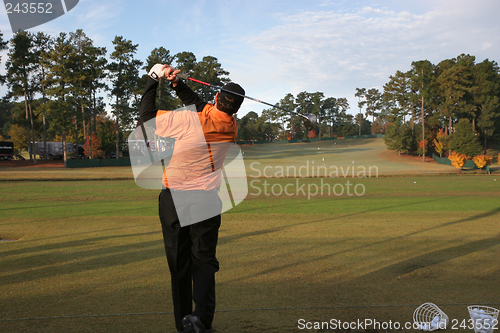 Image of man golf swing in east lake