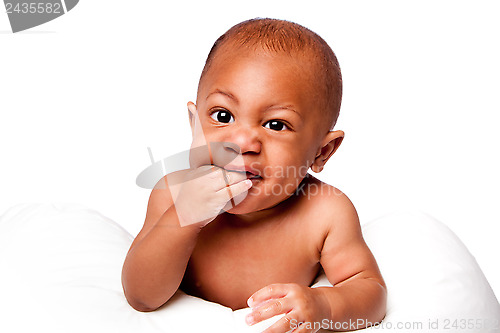 Image of Teething baby biting fingers
