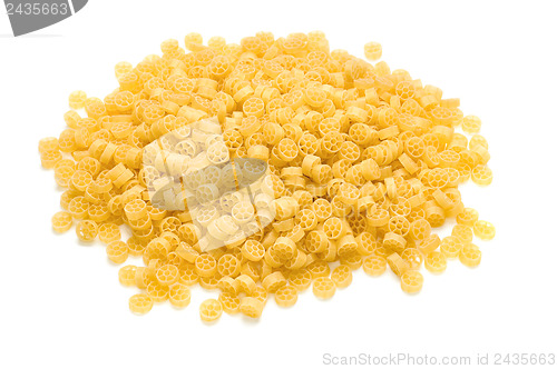 Image of heap of raw pasta on the white background