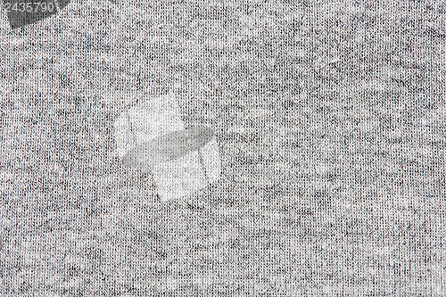 Image of High resolution close up of gray fabric with seams crossing.