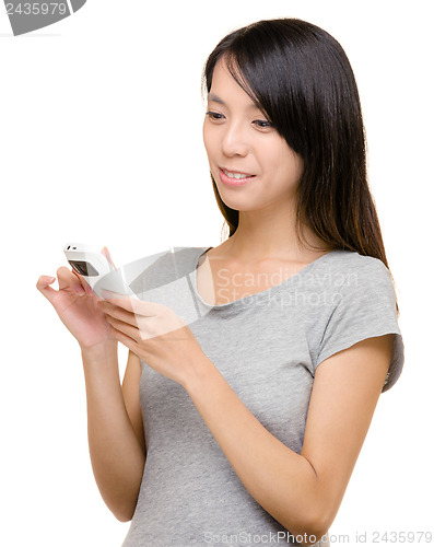 Image of Asian woman read sms on phone