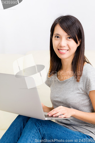 Image of Asian woman with laptop