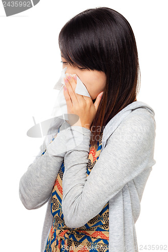 Image of Sneezing asian woman