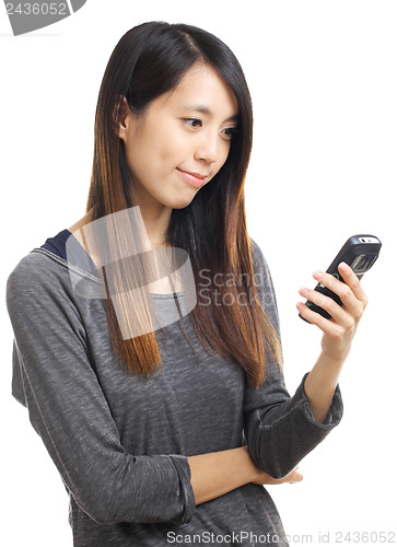 Image of Asian woman read sms on phone