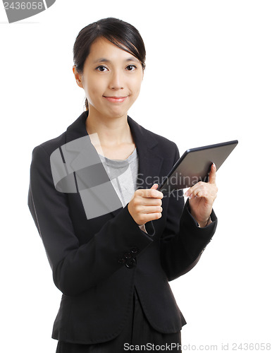 Image of Asian woman holding a tablet 