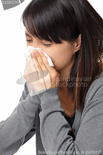 Image of Sneezing woman