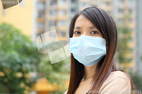 Image of Asian woman wear face mask 