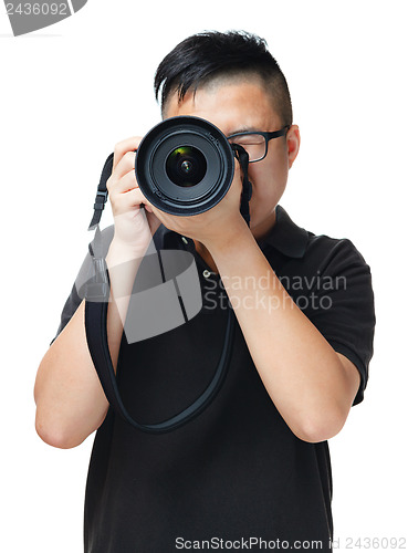 Image of Asian man using camera