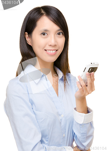 Image of Asian woman holding mobile