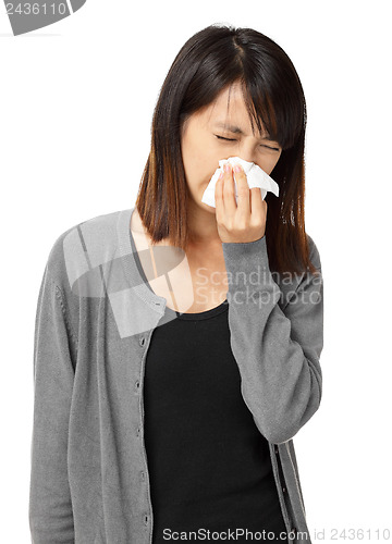 Image of Cold sneezing asian woman