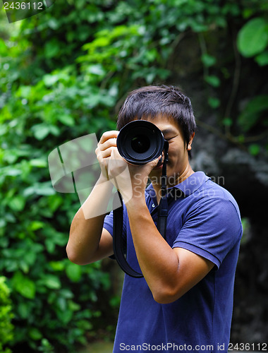 Image of Asian male photographer