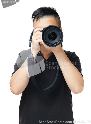 Image of Asian man using camera