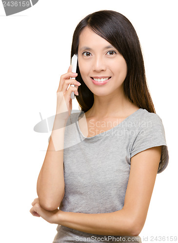 Image of asian woman on phone call 