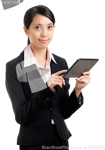 Image of Asian business woman using tablet pc