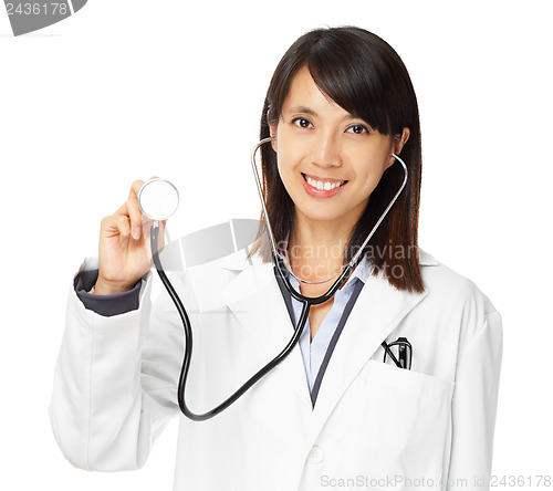 Image of Asian female doctor holding stethoscope