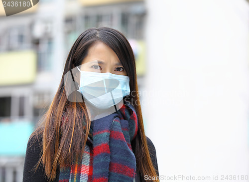 Image of woman wearing face mask