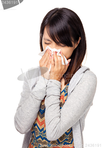 Image of Sneezing woman