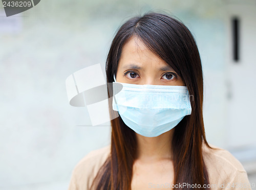 Image of Asian woman with face mask at outdoor