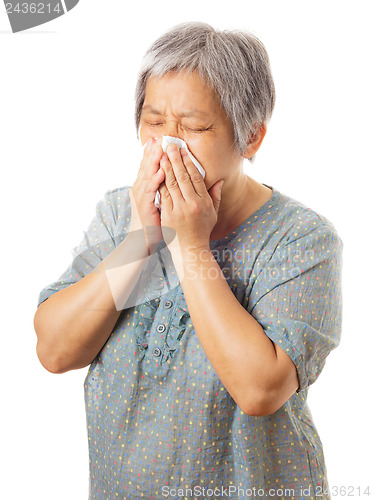 Image of Sneezing asian elderly woman