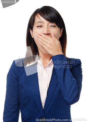 Image of Asian business woman feeling tried