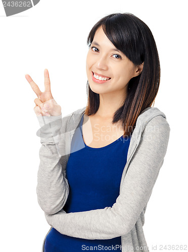 Image of young girl show victory sign isolated on white background