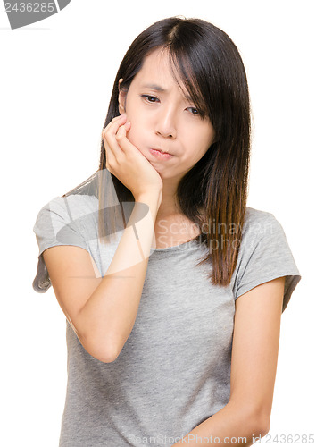 Image of Asian woman with toothache