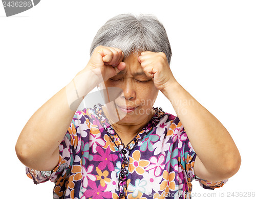 Image of Mature asian woman serious headache