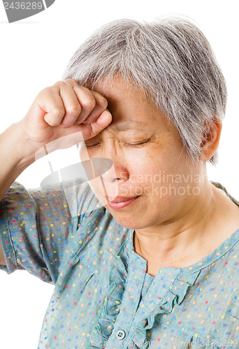 Image of Mature asian woman feel headache