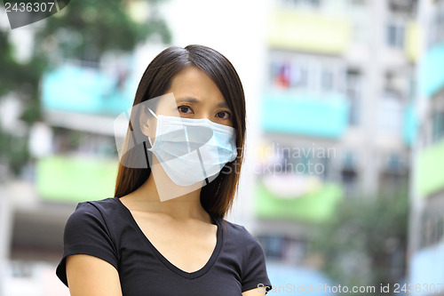 Image of Asian woman wear protective face mask