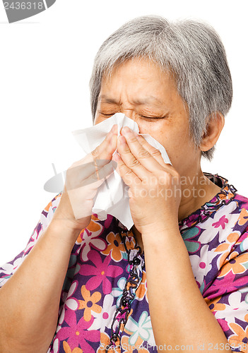 Image of Sneezing mature asian woman