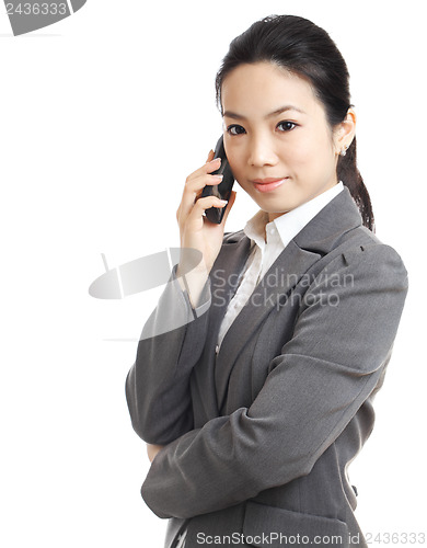 Image of asian business woman using mobile phone