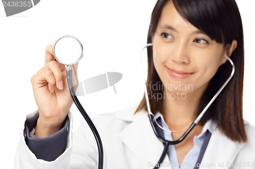 Image of Asian female doctor holding stethoscope