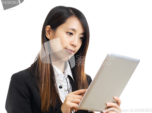 Image of asian business woman using computer tablet