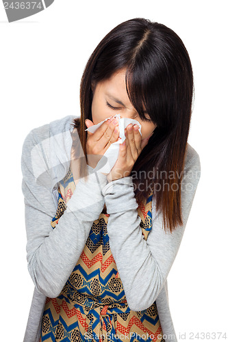 Image of Sneezing woman