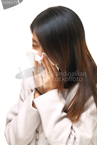 Image of Sneezing asian woman