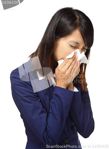 Image of Cold sneezing asian business woman