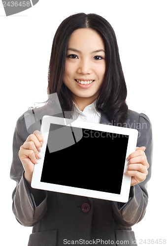 Image of Asian business woman hold tablet , focus on tablet